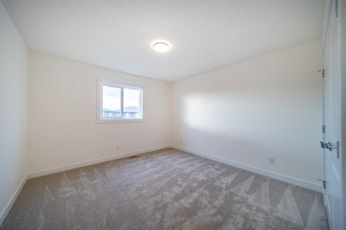 168 Creekstone Circle Sw, Calgary, AB - Indoor Photo Showing Other Room