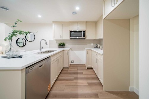 168 Creekstone Circle Sw, Calgary, AB - Indoor Photo Showing Kitchen With Double Sink