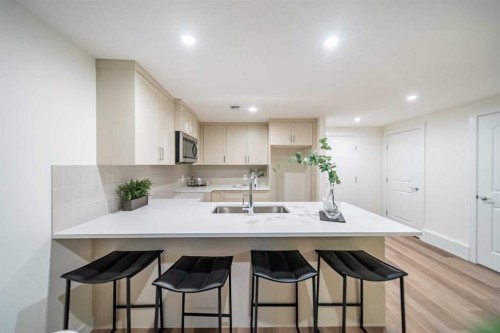 168 Creekstone Circle Sw, Calgary, AB - Indoor Photo Showing Kitchen With Double Sink