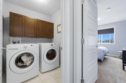 406 River Heights Crescent, Cochrane, AB - Indoor Photo Showing Laundry Room