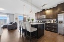 406 River Heights Crescent, Cochrane, AB  - Indoor Photo Showing Kitchen With Upgraded Kitchen 
