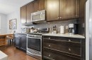406 River Heights Crescent, Cochrane, AB  - Indoor Photo Showing Kitchen 