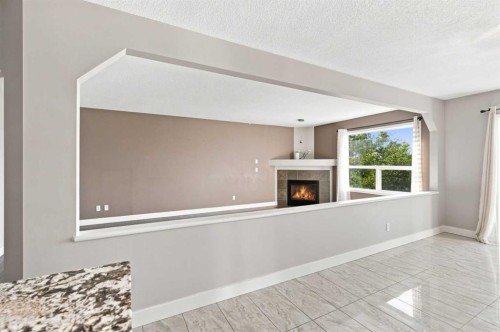 541 Citadel Meadow Bay Nw, Calgary, AB - Indoor With Fireplace