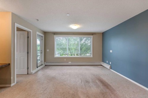 1213-4 Kingsland Close Se, Airdrie, AB - Indoor Photo Showing Other Room