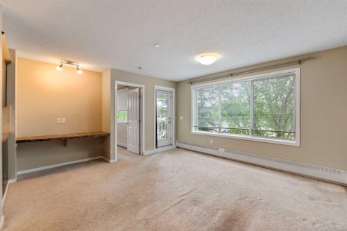 1213-4 Kingsland Close Se, Airdrie, AB - Indoor Photo Showing Other Room