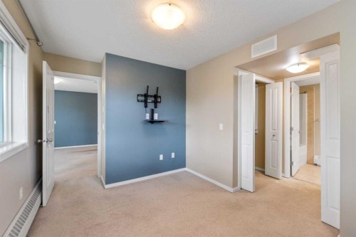 1213-4 Kingsland Close Se, Airdrie, AB - Indoor Photo Showing Other Room