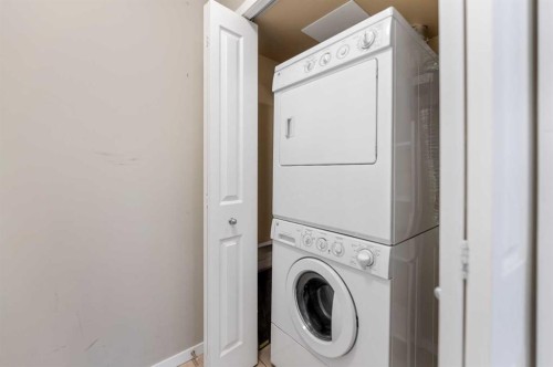 1213-4 Kingsland Close Se, Airdrie, AB - Indoor Photo Showing Laundry Room