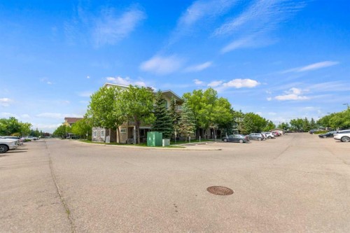 1213-4 Kingsland Close Se, Airdrie, AB - Outdoor