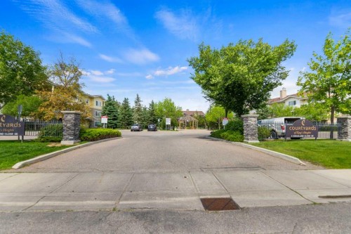 1213-4 Kingsland Close Se, Airdrie, AB - Outdoor