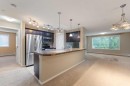 1213-4 Kingsland Close Se, Airdrie, AB  - Indoor Photo Showing Kitchen 
