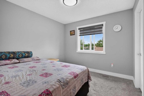 120 Castlegrove Road Ne, Calgary, AB - Indoor Photo Showing Bedroom