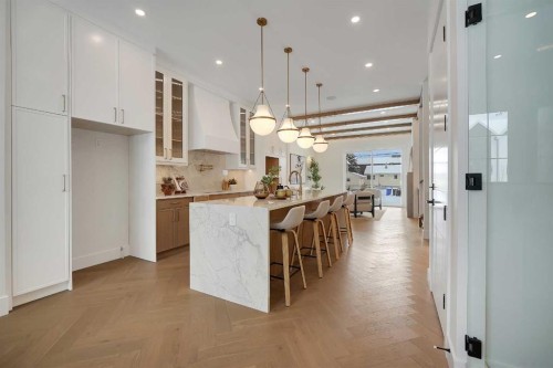 907 36A Street Nw, Calgary, AB - Indoor Photo Showing Kitchen With Upgraded Kitchen