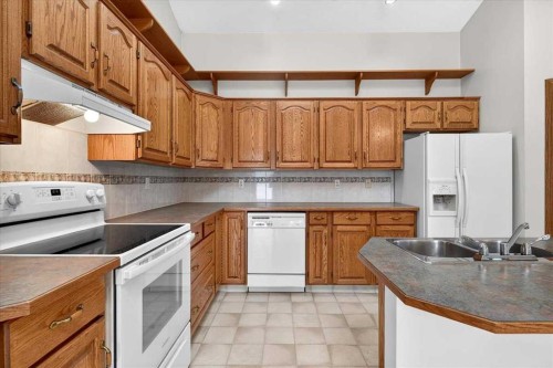 1 Harvest Park Place Ne, Calgary, AB - Indoor Photo Showing Kitchen With Double Sink