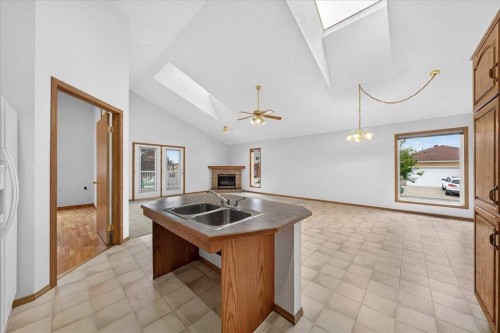 1 Harvest Park Place Ne, Calgary, AB - Indoor Photo Showing Kitchen With Double Sink