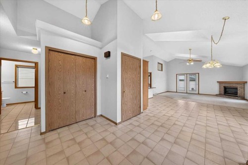 1 Harvest Park Place Ne, Calgary, AB - Indoor Photo Showing Other Room With Fireplace