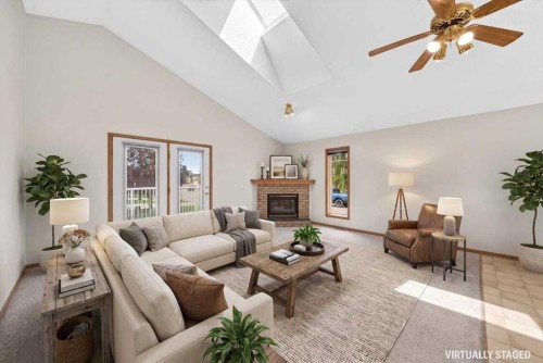 1 Harvest Park Place Ne, Calgary, AB - Indoor Photo Showing Living Room With Fireplace