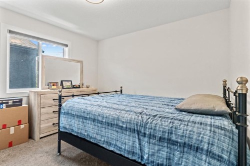 129 Marina Key, Chestermere, AB - Indoor Photo Showing Bedroom