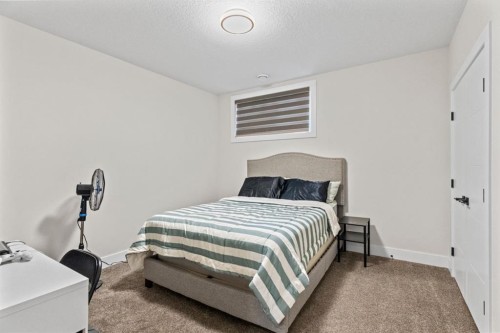 129 Marina Key, Chestermere, AB - Indoor Photo Showing Bedroom