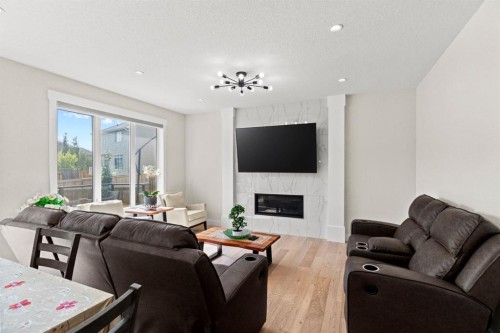 129 Marina Key, Chestermere, AB - Indoor Photo Showing Living Room With Fireplace
