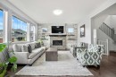 229 Stonemere Bay, Chestermere, AB  - Indoor Photo Showing Living Room With Fireplace 