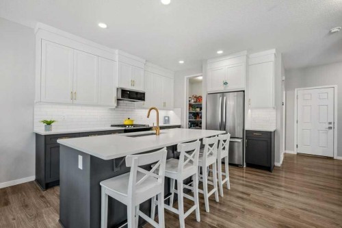 114 Crestbrook Way Sw, Calgary, AB - Indoor Photo Showing Kitchen With Upgraded Kitchen