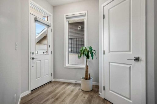 114 Crestbrook Way Sw, Calgary, AB - Indoor Photo Showing Other Room