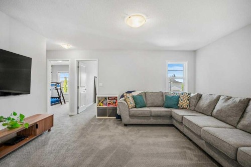 114 Crestbrook Way Sw, Calgary, AB - Indoor Photo Showing Living Room