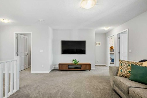 114 Crestbrook Way Sw, Calgary, AB - Indoor Photo Showing Living Room