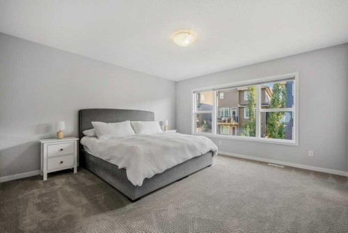 114 Crestbrook Way Sw, Calgary, AB - Indoor Photo Showing Bedroom