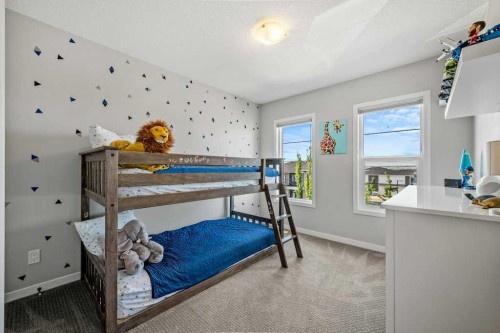 114 Crestbrook Way Sw, Calgary, AB - Indoor Photo Showing Bedroom