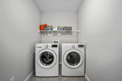 114 Crestbrook Way Sw, Calgary, AB - Indoor Photo Showing Laundry Room