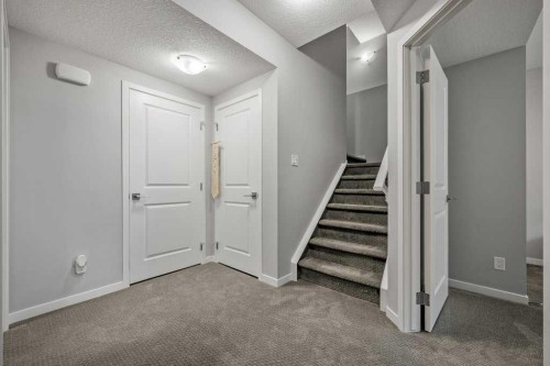 114 Crestbrook Way Sw, Calgary, AB - Indoor Photo Showing Other Room