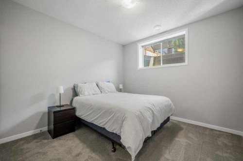 114 Crestbrook Way Sw, Calgary, AB - Indoor Photo Showing Bedroom