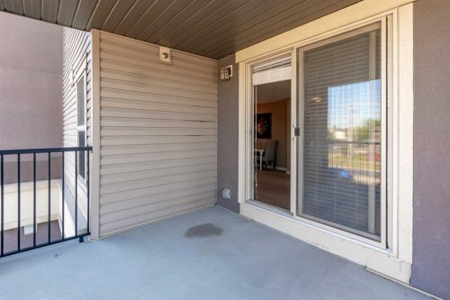 7202-403 Mackenzie Way Sw, Airdrie, AB - Outdoor With Balcony With Exterior