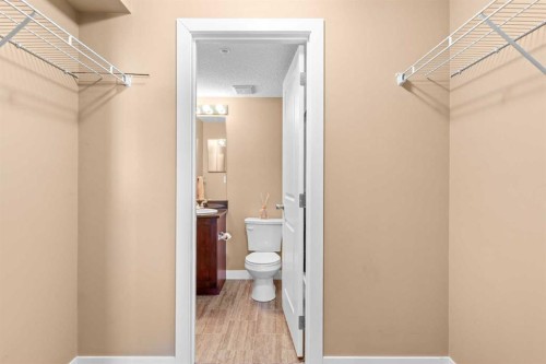 7202-403 Mackenzie Way Sw, Airdrie, AB - Indoor Photo Showing Bathroom