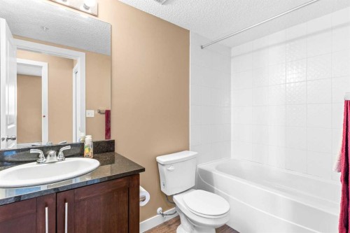 7202-403 Mackenzie Way Sw, Airdrie, AB - Indoor Photo Showing Bathroom