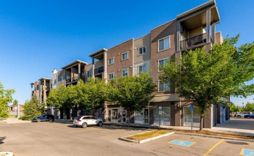 7202-403 Mackenzie Way Sw, Airdrie, AB - Outdoor With Balcony