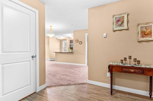 7202-403 Mackenzie Way Sw, Airdrie, AB - Indoor Photo Showing Other Room