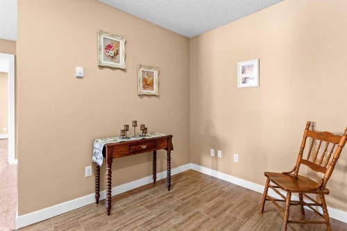 7202-403 Mackenzie Way Sw, Airdrie, AB - Indoor Photo Showing Other Room