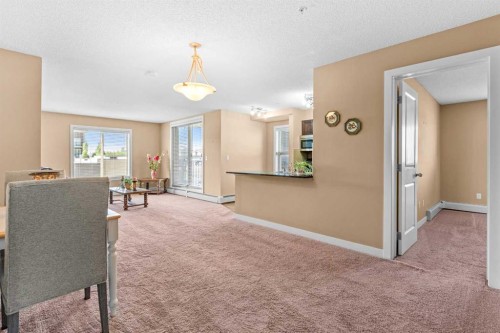 7202-403 Mackenzie Way Sw, Airdrie, AB - Indoor Photo Showing Other Room