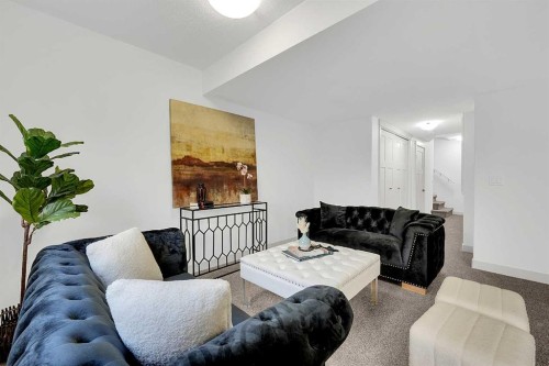 570 Evanston Manor Nw, Calgary, AB - Indoor Photo Showing Living Room