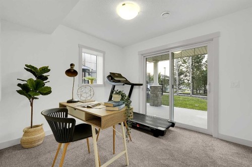 570 Evanston Manor Nw, Calgary, AB - Indoor Photo Showing Gym Room