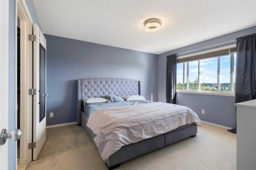 13 Tuscany Springs Circle Nw, Calgary, AB - Indoor Photo Showing Bedroom
