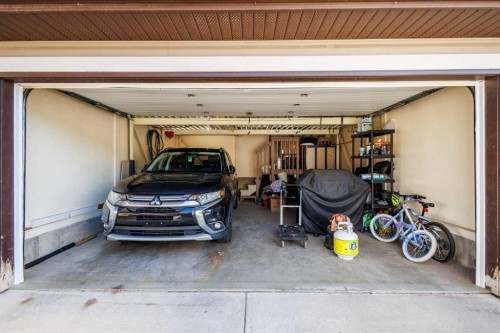 13 Tuscany Springs Circle Nw, Calgary, AB - Indoor Photo Showing Garage
