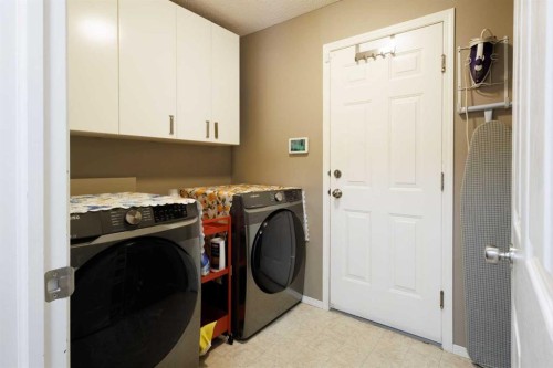 13 Tuscany Springs Circle Nw, Calgary, AB - Indoor Photo Showing Laundry Room