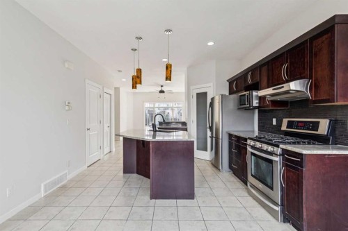 12 Autumn Court Se, Calgary, AB - Indoor Photo Showing Kitchen With Upgraded Kitchen