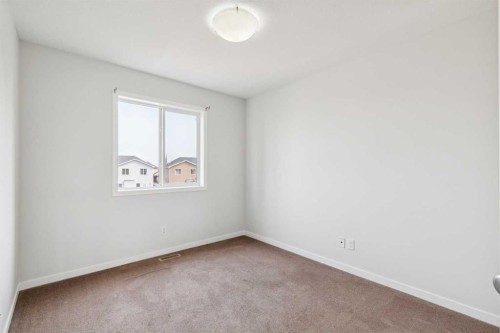 12 Autumn Court Se, Calgary, AB - Indoor Photo Showing Other Room