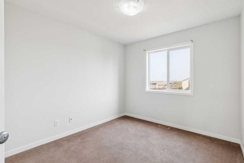 12 Autumn Court Se, Calgary, AB - Indoor Photo Showing Other Room