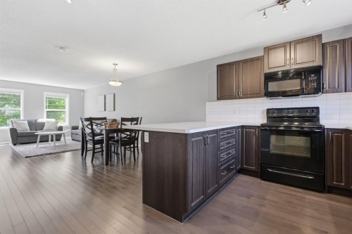 4008 New Brighton Grove Se, Calgary, AB - Indoor Photo Showing Kitchen