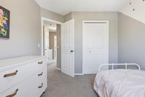 4008 New Brighton Grove Se, Calgary, AB - Indoor Photo Showing Bedroom
